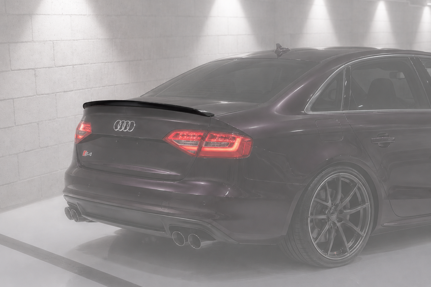 Audi S4 rear end with carbon fiber trunk spoiler, collection banner for Audi spoiler parts