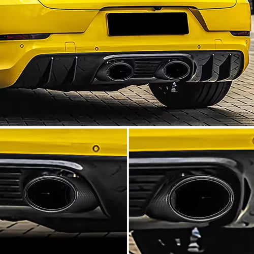 Close-up of rear bumper showing dual exhaust carbon fiber outlets