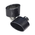 Two carbon fiber exhaust tips with a glossy woven texture and silver metal clamps