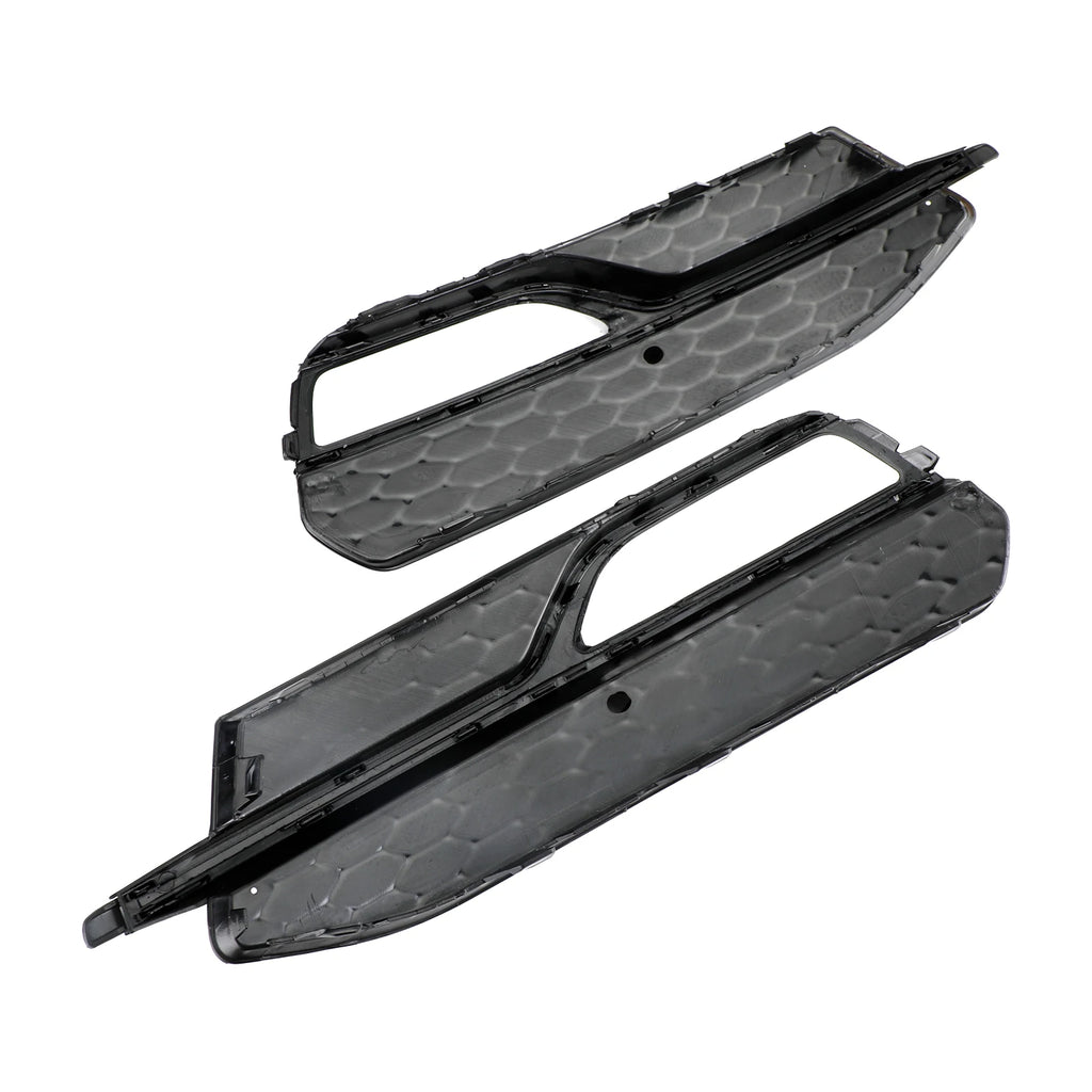 Underside view of Audi A3 S-Line/S3 8V honeycomb fog light grille pair showing mounting tabs