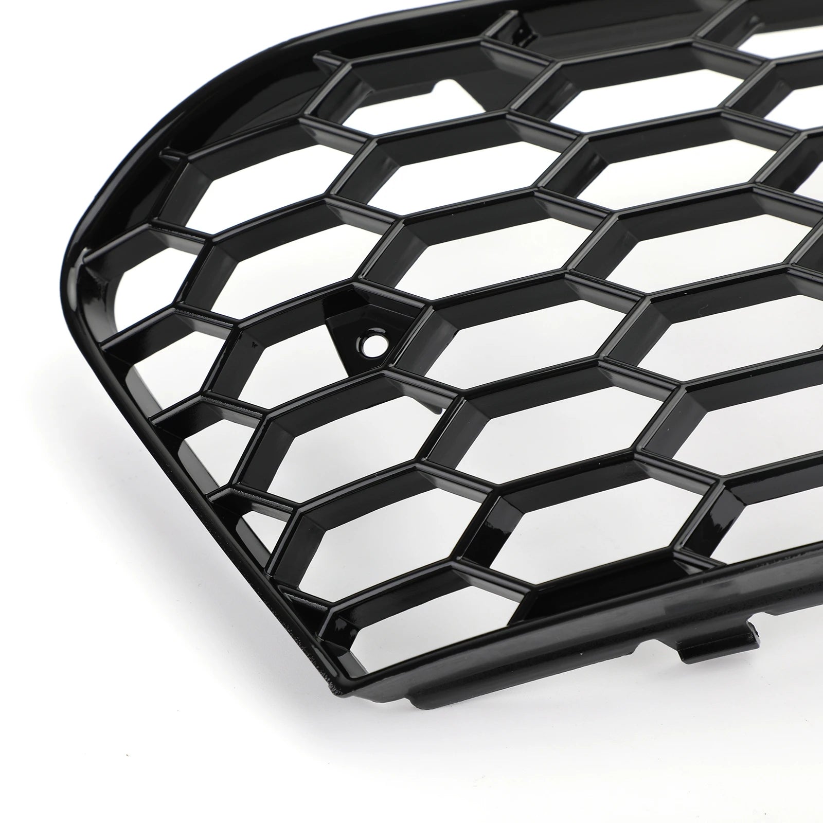 Close-up of honeycomb mesh texture and corner detail on Audi A4 B8 fog light grille