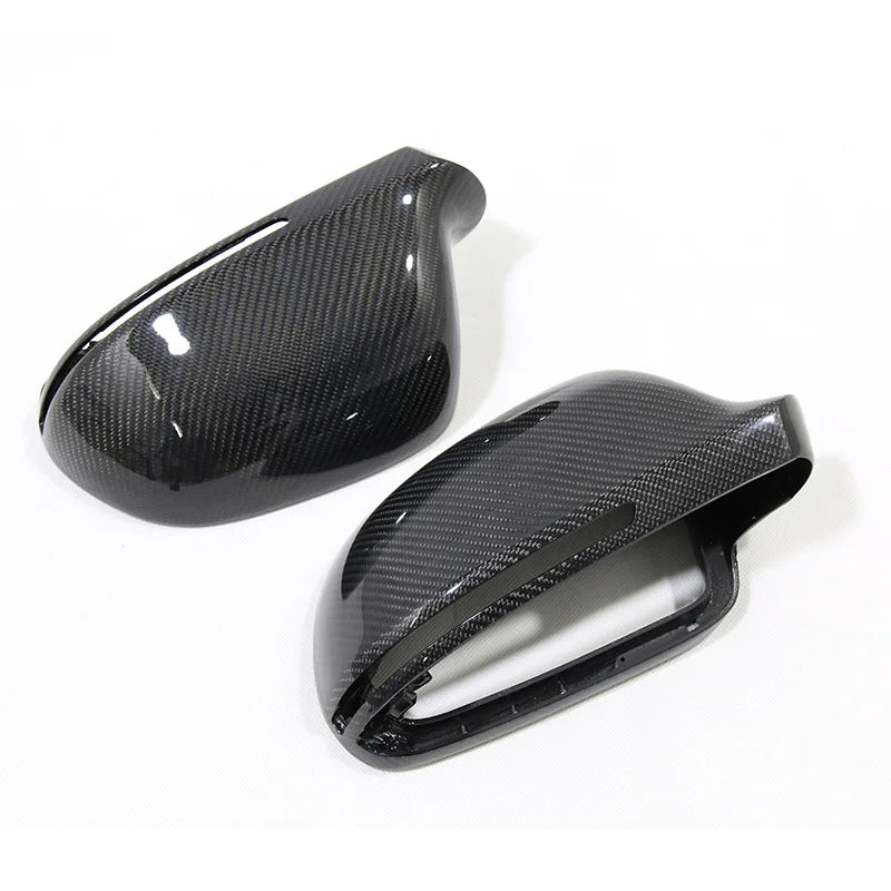 Carbon fiber mirror covers for Audi A4 B8, angled pair view showing indicator cutout