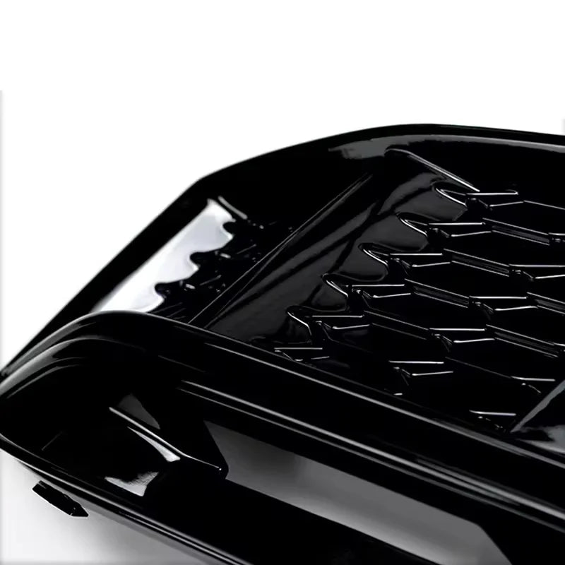 Close-up detail of honeycomb mesh texture on RS4 style Audi B9 grille